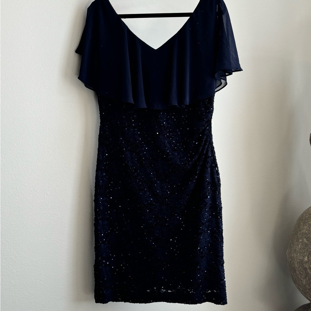 Navy sequin dress, option to wear off the shoulders, pull in style.